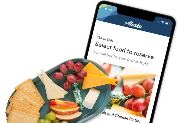 Image of a plate of food and a mobile phone with an order screen.